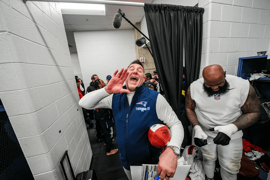 Mike Vrable celebrates in the locker room after win over the Ravens
